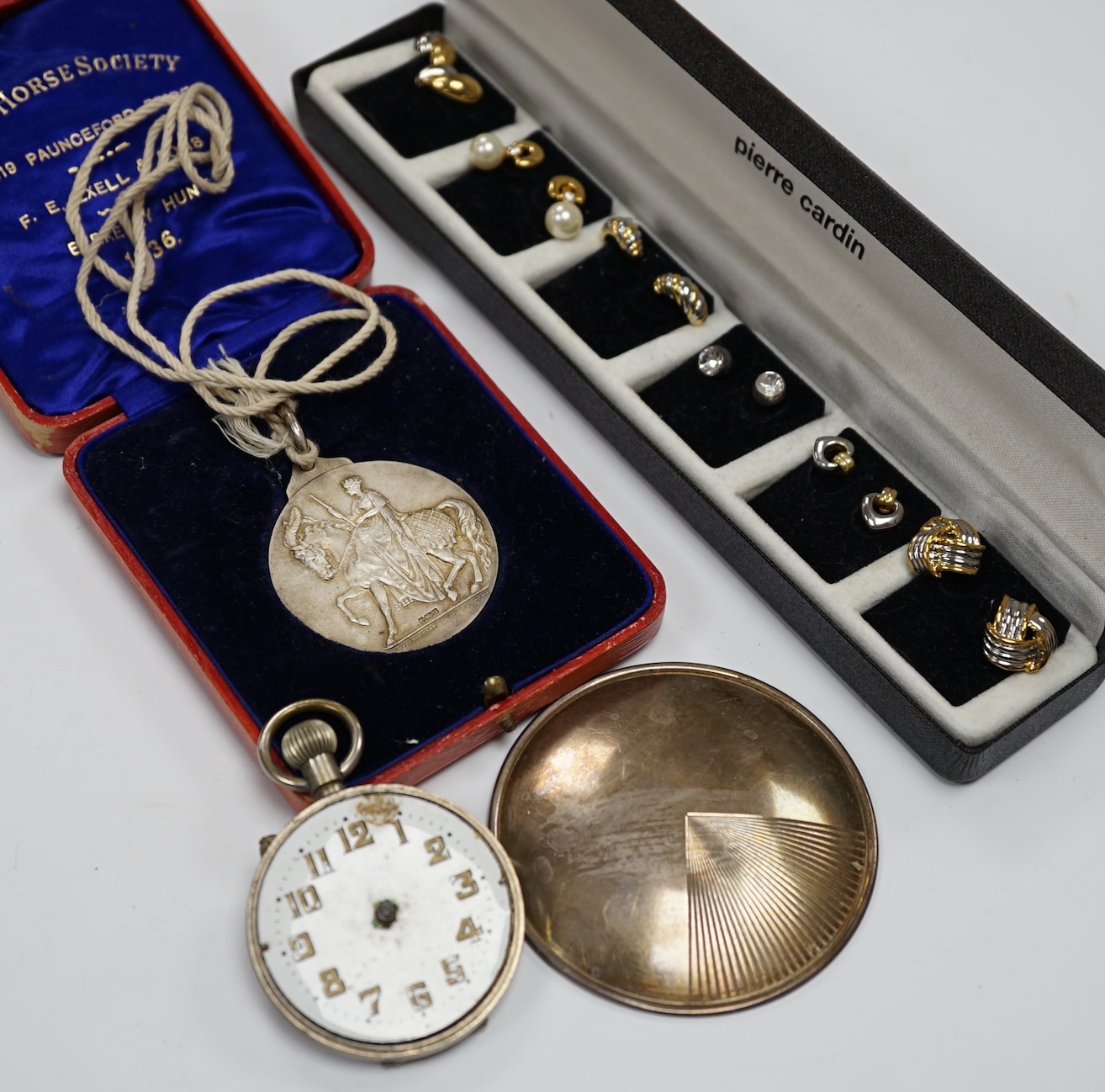 A late Victorian silver oval locket on a white metal chain and other jewellery etc., including three rings, a pocket watch and two modern silver brooches by Clive Edward Burr, largest 75mm. Condition - varies, poor to fa